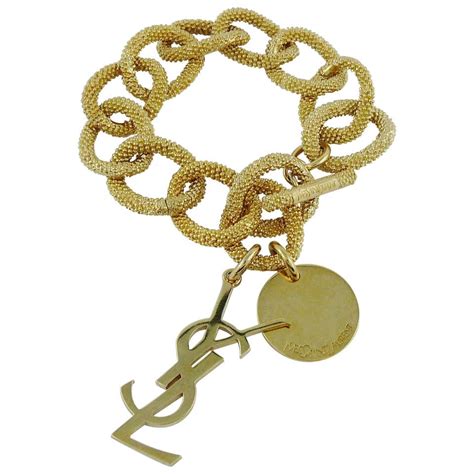 ysl charm bracelet gold brass|yves saint laurent leather bracelet.